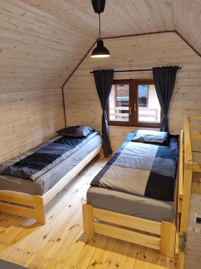 Domki Pod Debami โปเบียโรโว ภายนอก รูปภาพ